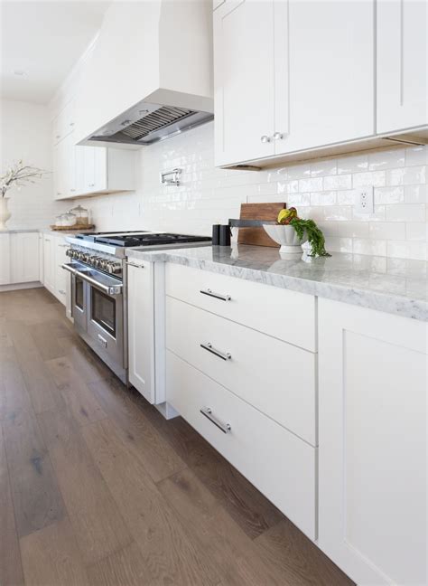 stainless steel backsplash white cabinets|best backsplash for white countertops.